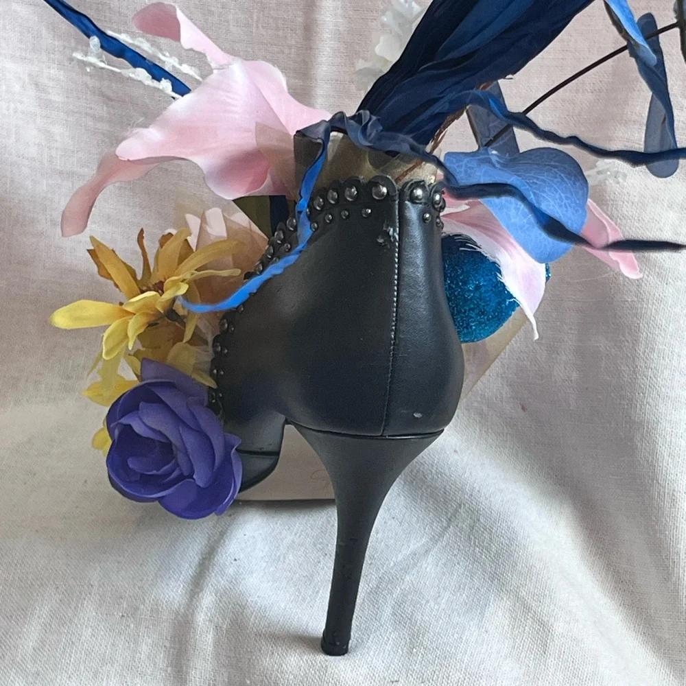 Runway For Hope Elegant Floral Shoe Arrangement with Pink and Blue Accents